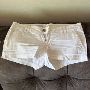 Used white low rise shorts.